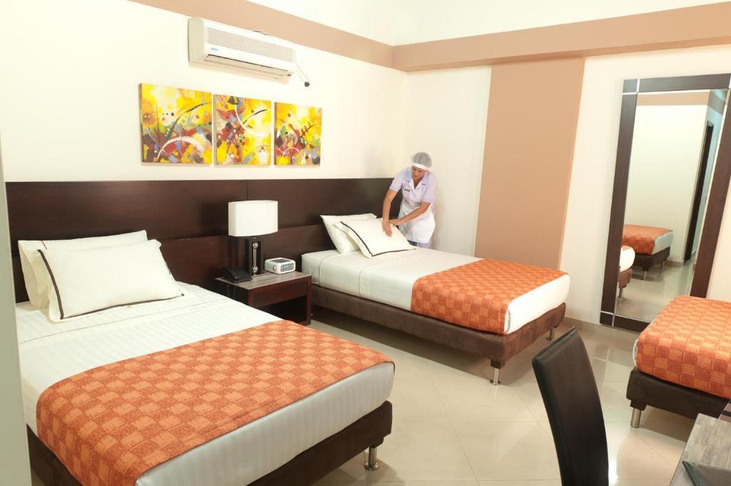 Hotel Alameda De La 10 ميديلين الغرفة الصورة